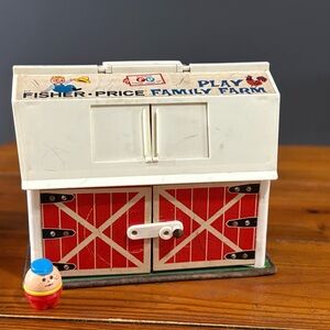 Vintage 1967 Fisher-Price Play Family Farm barn toy with moo sound